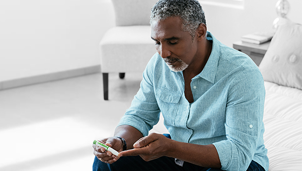 man looking at phone