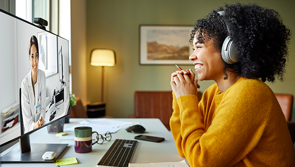 woman attending telemedicine appointment on computer